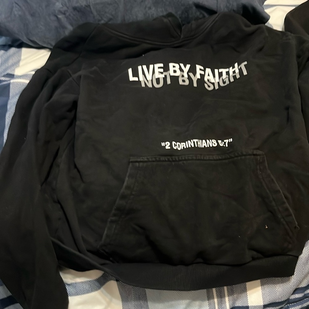Black hoodie
With 2 Corinthians 5:7 abbreviated
